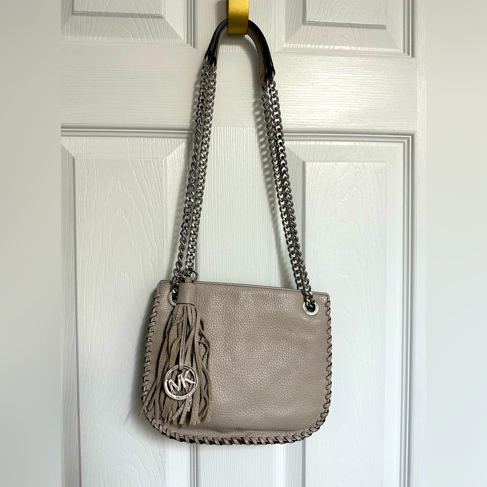 MICHAEL Michael Kors 2 way shoulder/crossbody taupe/light grey tassel bag